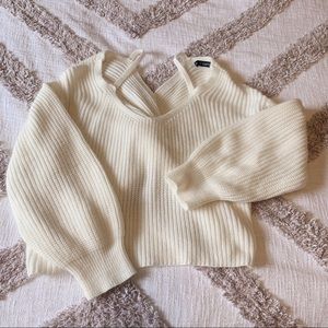 White knotted-back sweater